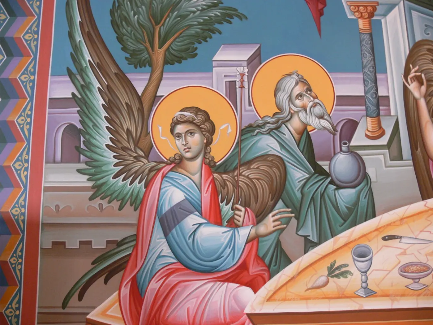Detail of the Hospitality of Abraham fresco with an angel and Abraham